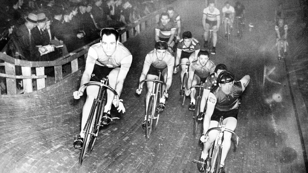 A six-day race held on February 12, 1939, at the Chicago Stadium. Heinz Vopel of Germany (left) and Gerard Debaets of Belgium lead—oh, and Heinz had just fractured his left wrist two weeks prior.